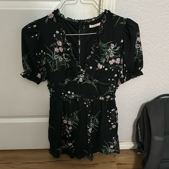 Pretty black romper with flowers 
Size small - Picture 1 of 1